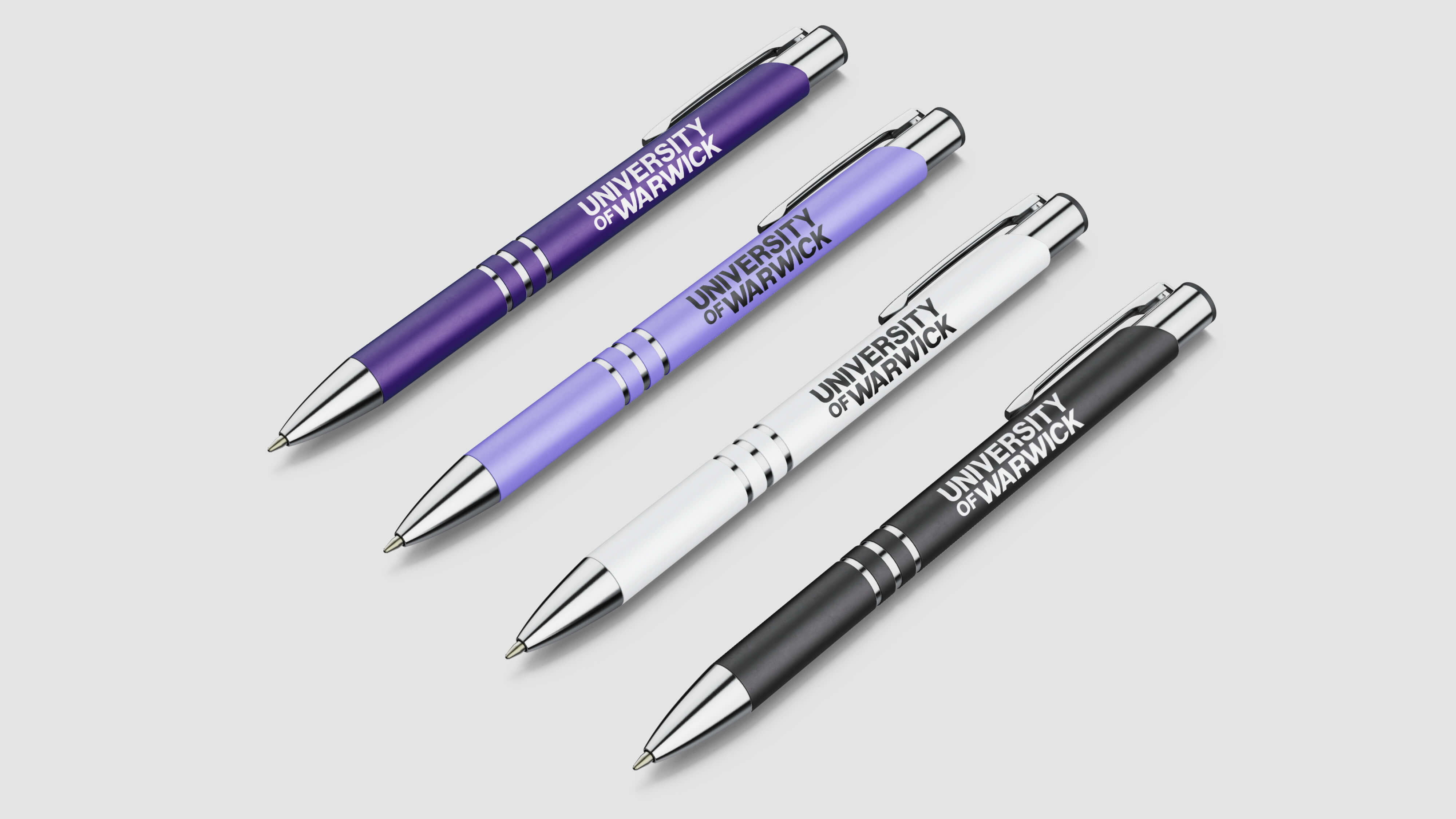 Branded pens with the University of Warwick wordmark.
