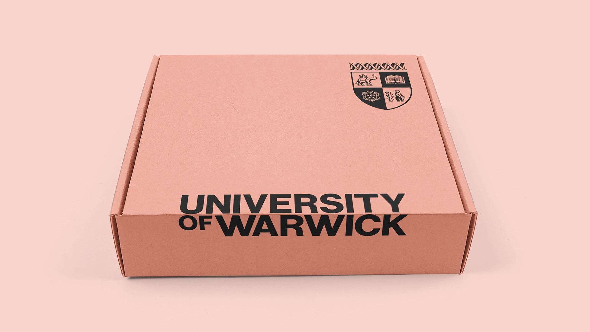 Box featuring University of Warwick text and crest on a pink background