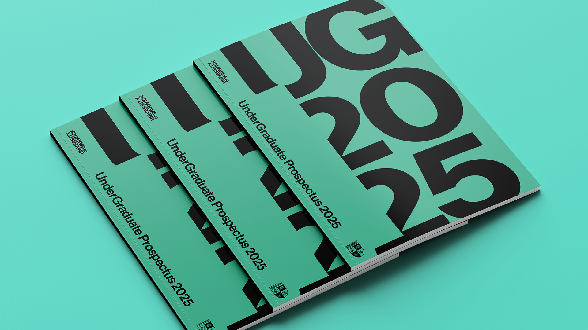 Undergraduate prospectus booklets on a green background