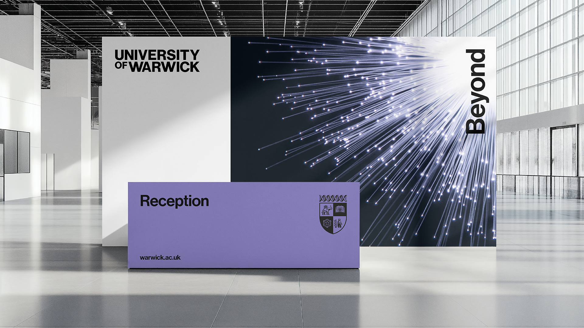 Display of University of Warwick signs in a light room